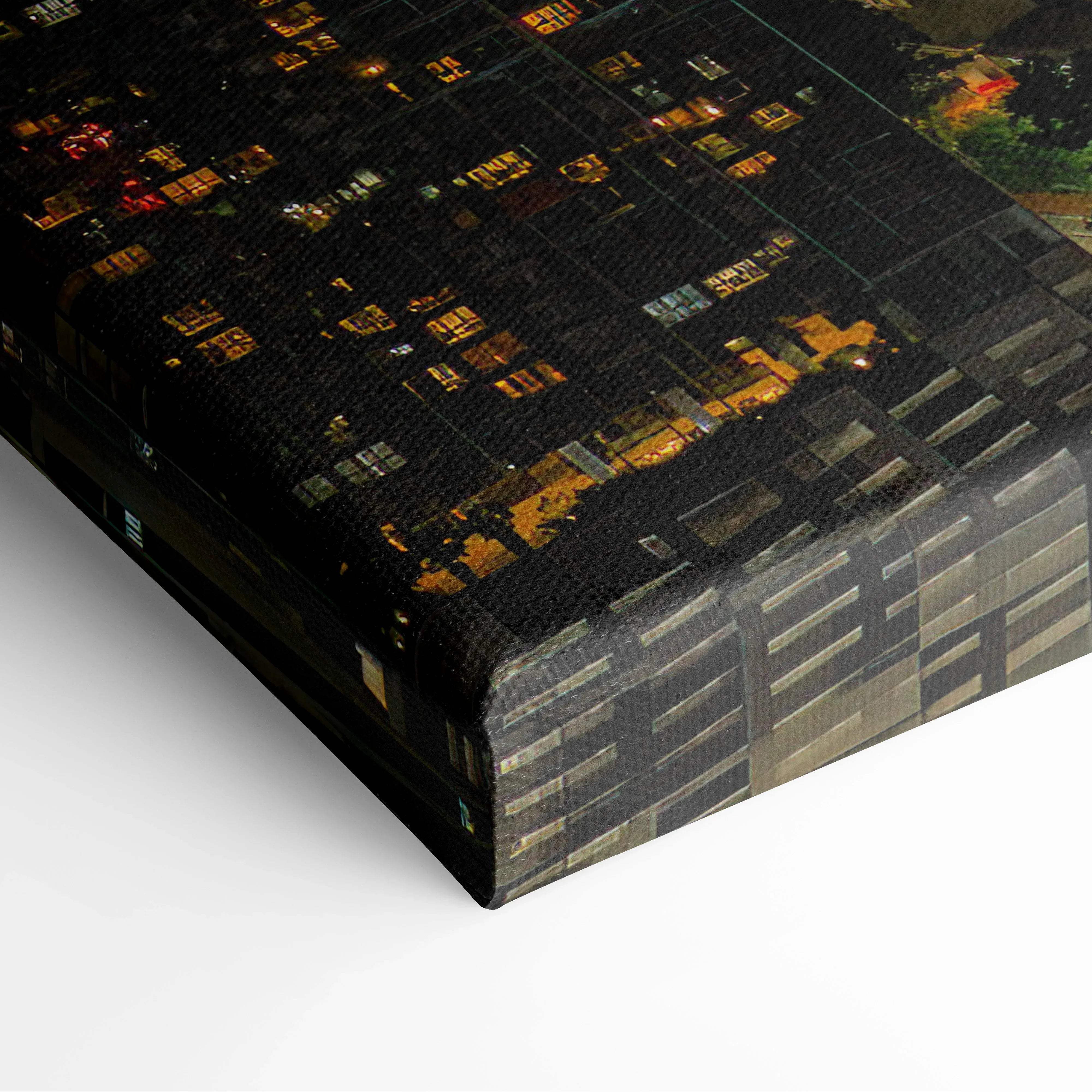 A black canvas print of an urban night cityscape with warm amber windows and deep blue skyline at dusk wall art