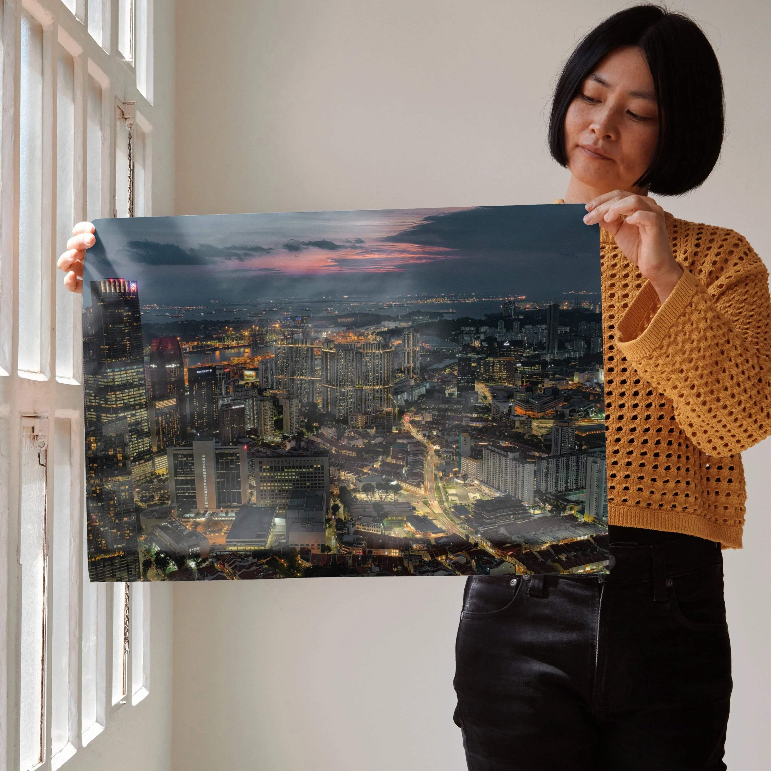 Vibrant city nightscape poster with glowing city lights and dark sky, perfect wall art for urban decor.