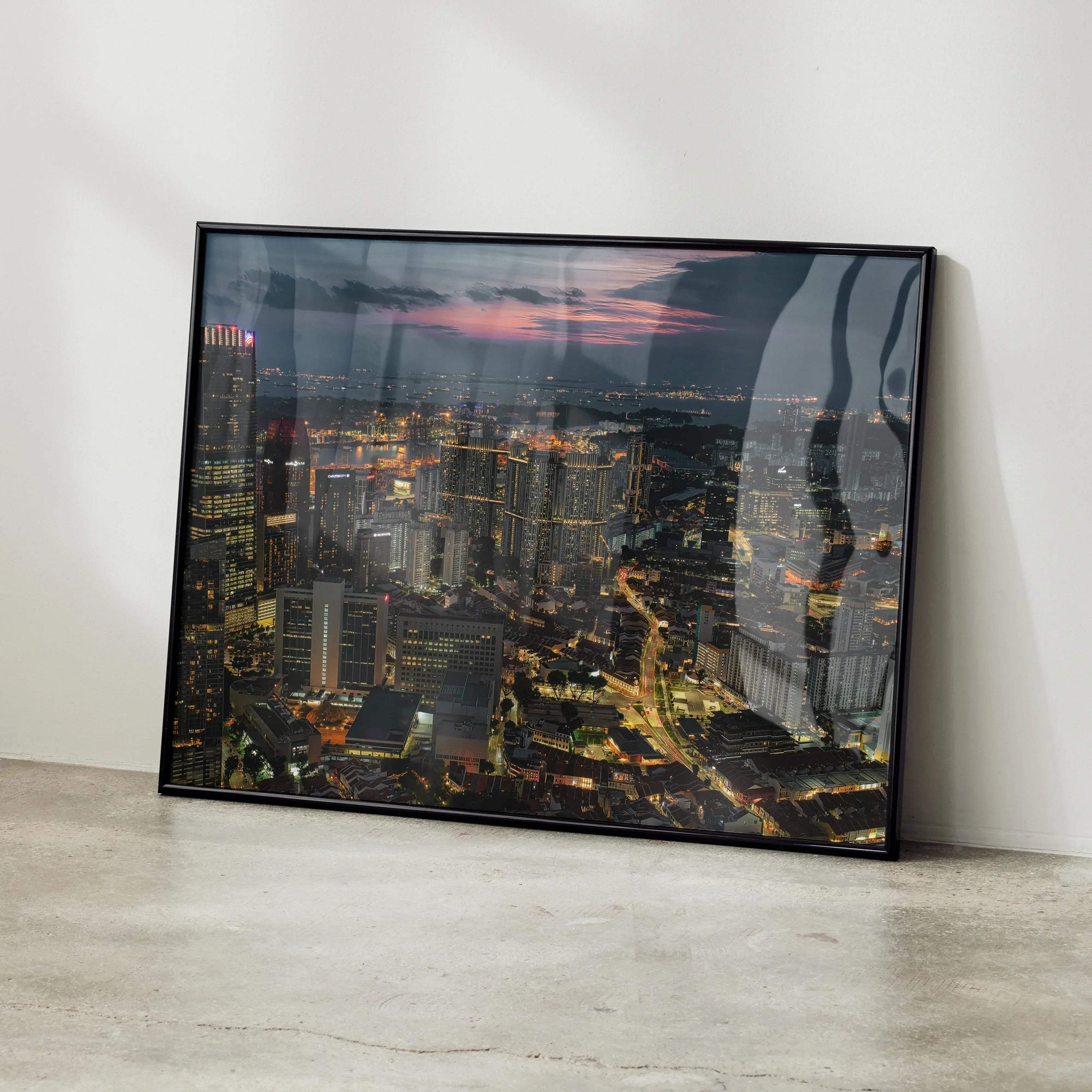 Vibrant city nightscape poster with illuminated buildings and streets, modern wall art.