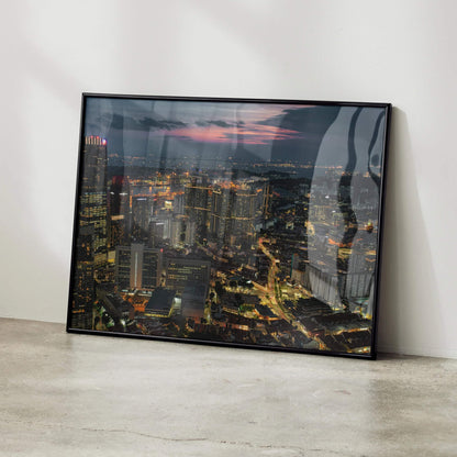 Vibrant city nightscape poster with illuminated buildings and streets, modern wall art.