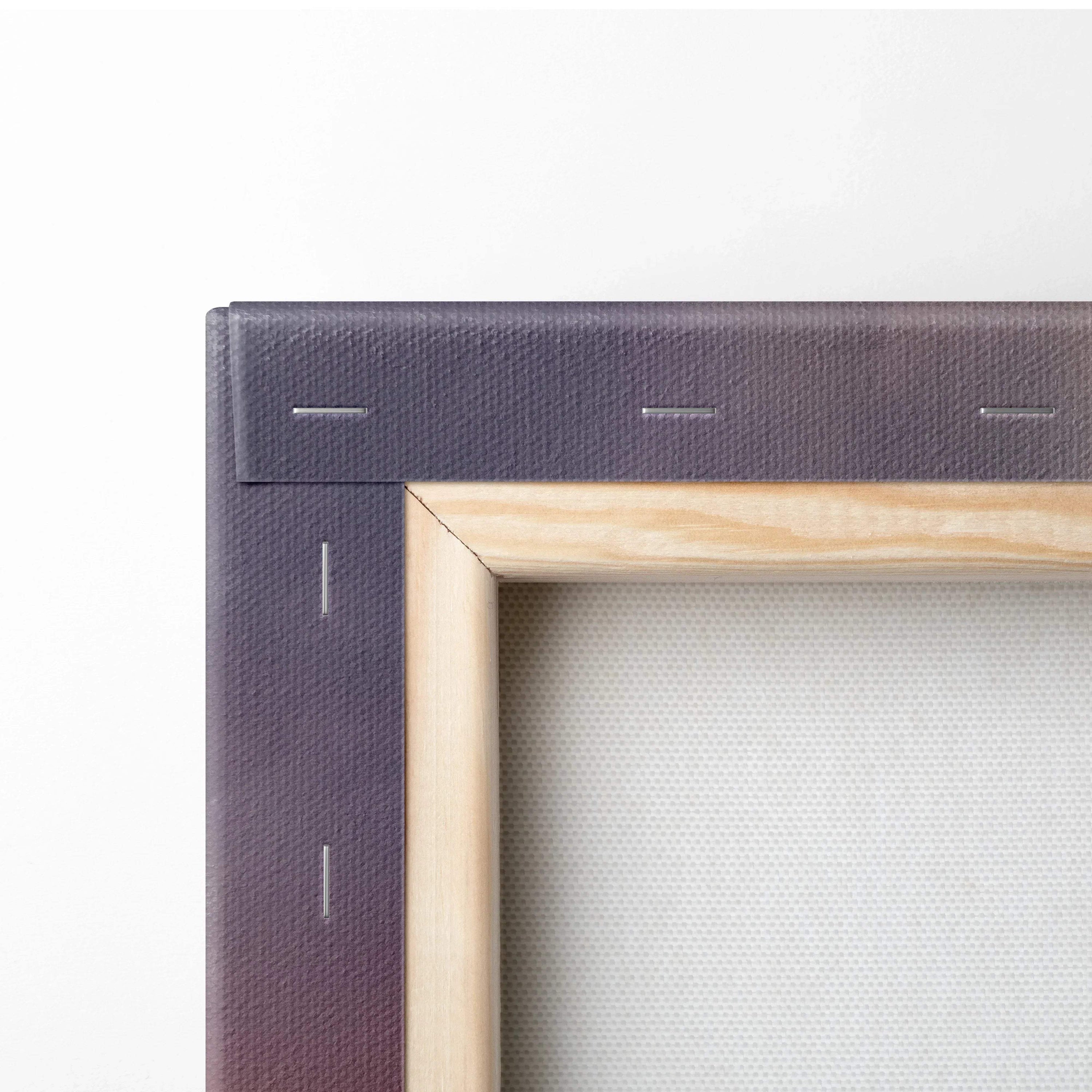 Close-up of wooden stretcher frame and purple canvas edge of wall art print.