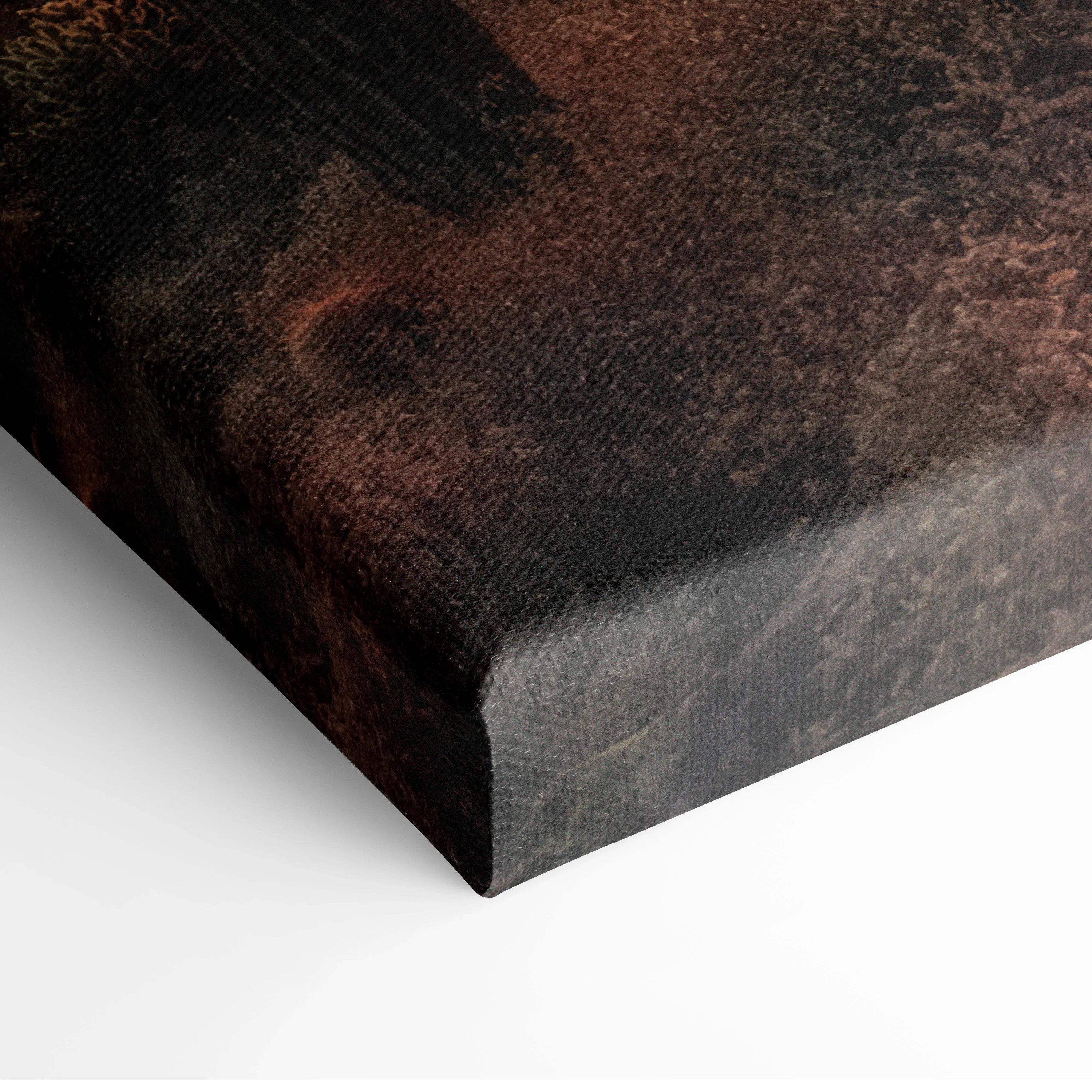 Close-up of dark textured canvas wall art corner with rich desert sunset tones.