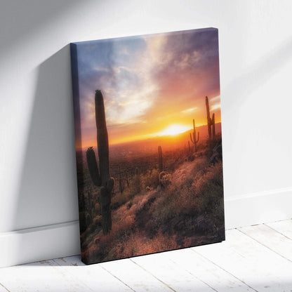 Canvas wall art featuring a vibrant desert sunset with cacti silhouetted against colorful sky.