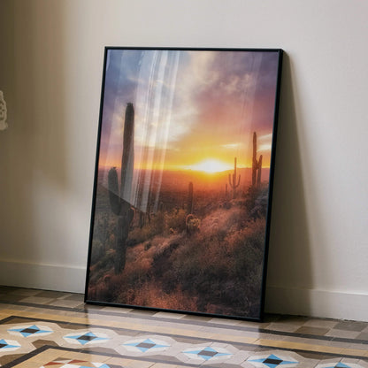 Vertical desert sunset poster wall art with cacti and warm orange sky tones.