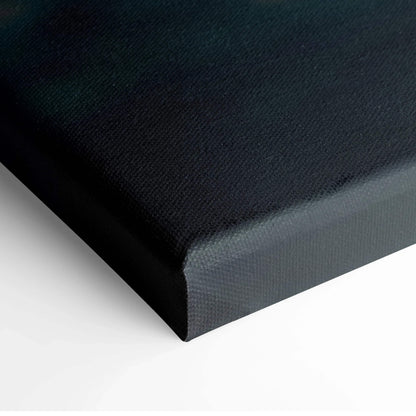 Close-up of black fabric textured canvas wall art corner with wrapped edges.