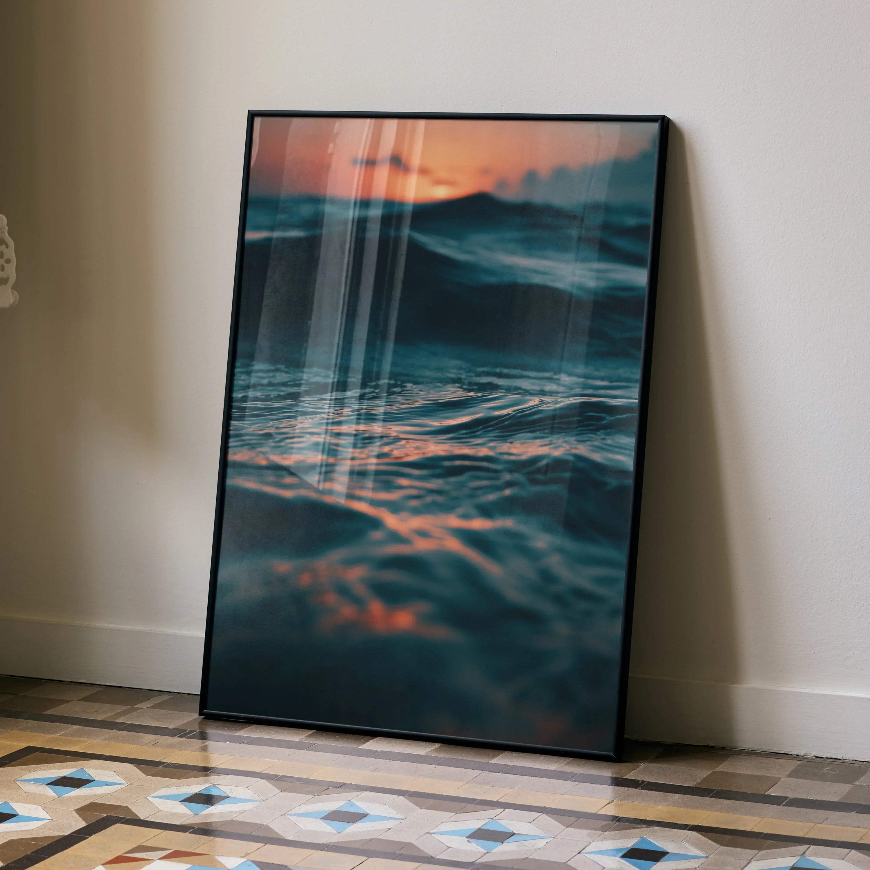 Ocean sunset wall art poster with vibrant orange sky and deep blue waves in vertical format.