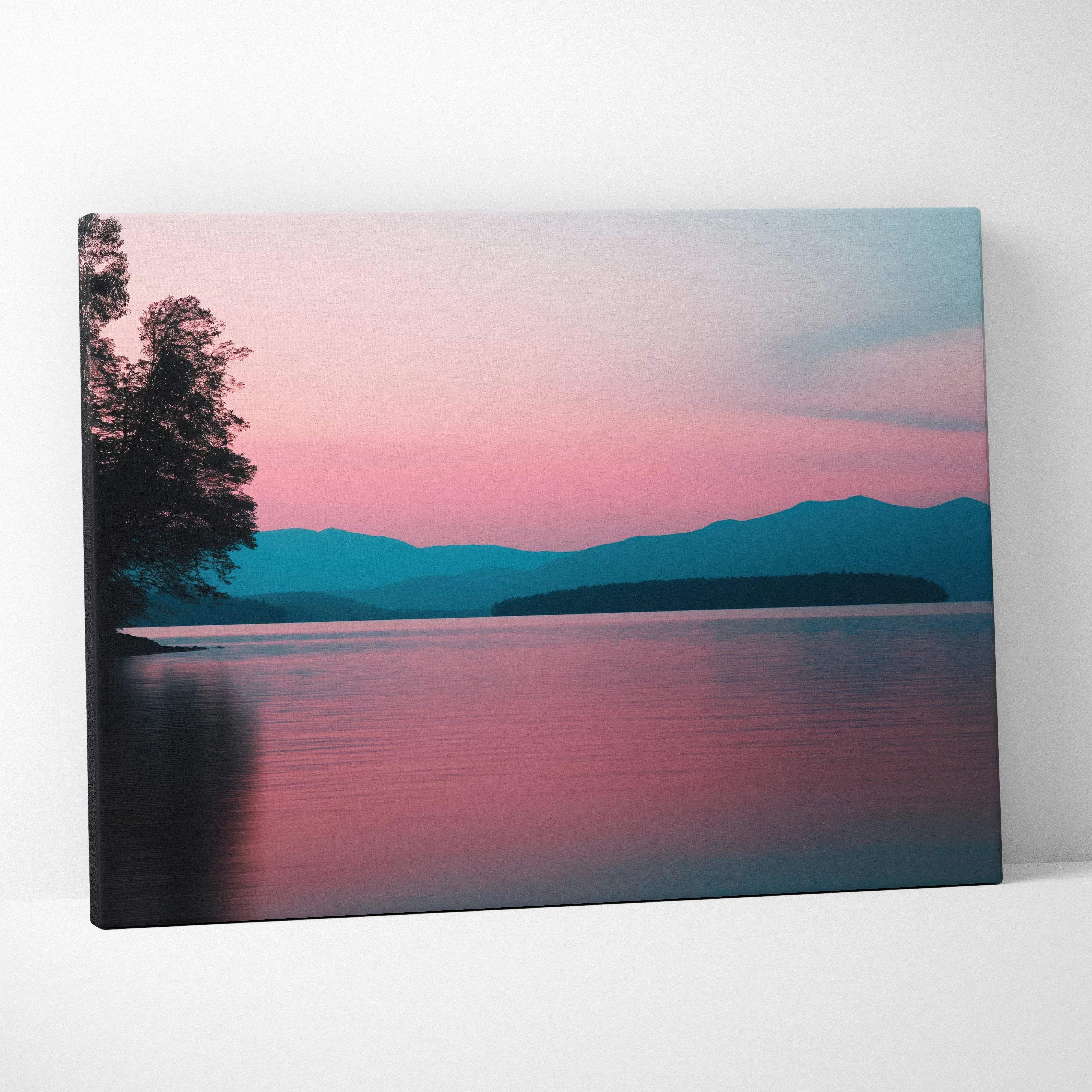 Rectangular canvas print of pastel sunset landscape over serene lake with silhouetted trees and mountain reflections