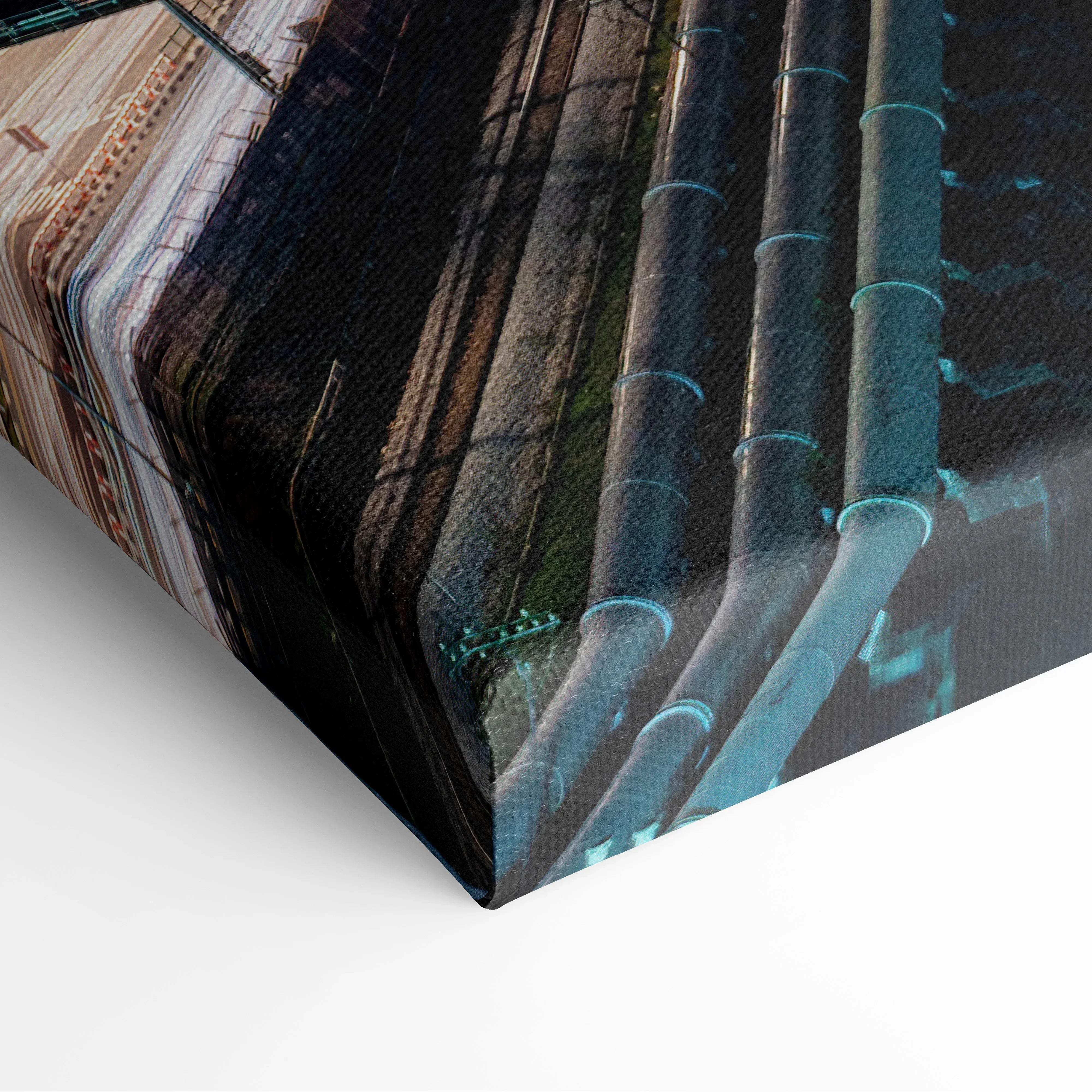 Canvas print featuring a high-contrast industrial scene with dark pipes and weathered buildings in vibrant night lights