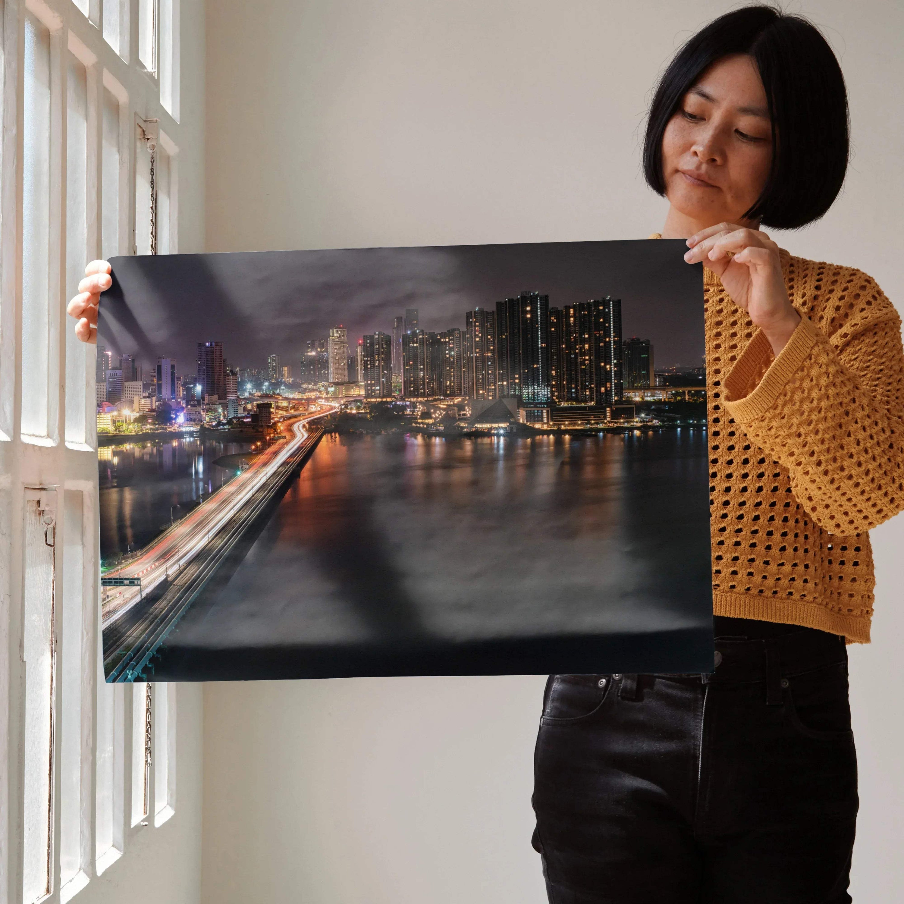 Vibrant city night skyline poster with illuminated buildings and reflections on water, wall art for modern decor.
