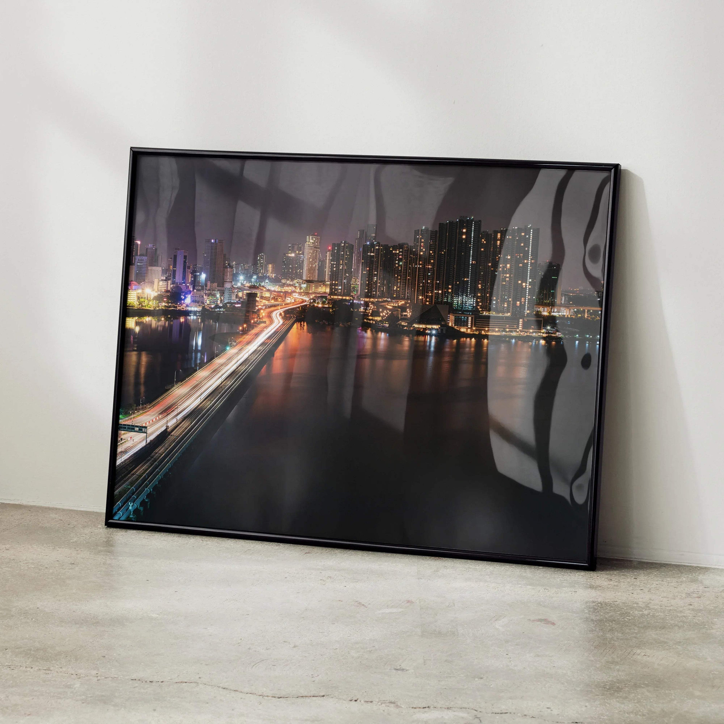 Vibrant city night skyline wall art poster with illuminated buildings and bridge reflections.