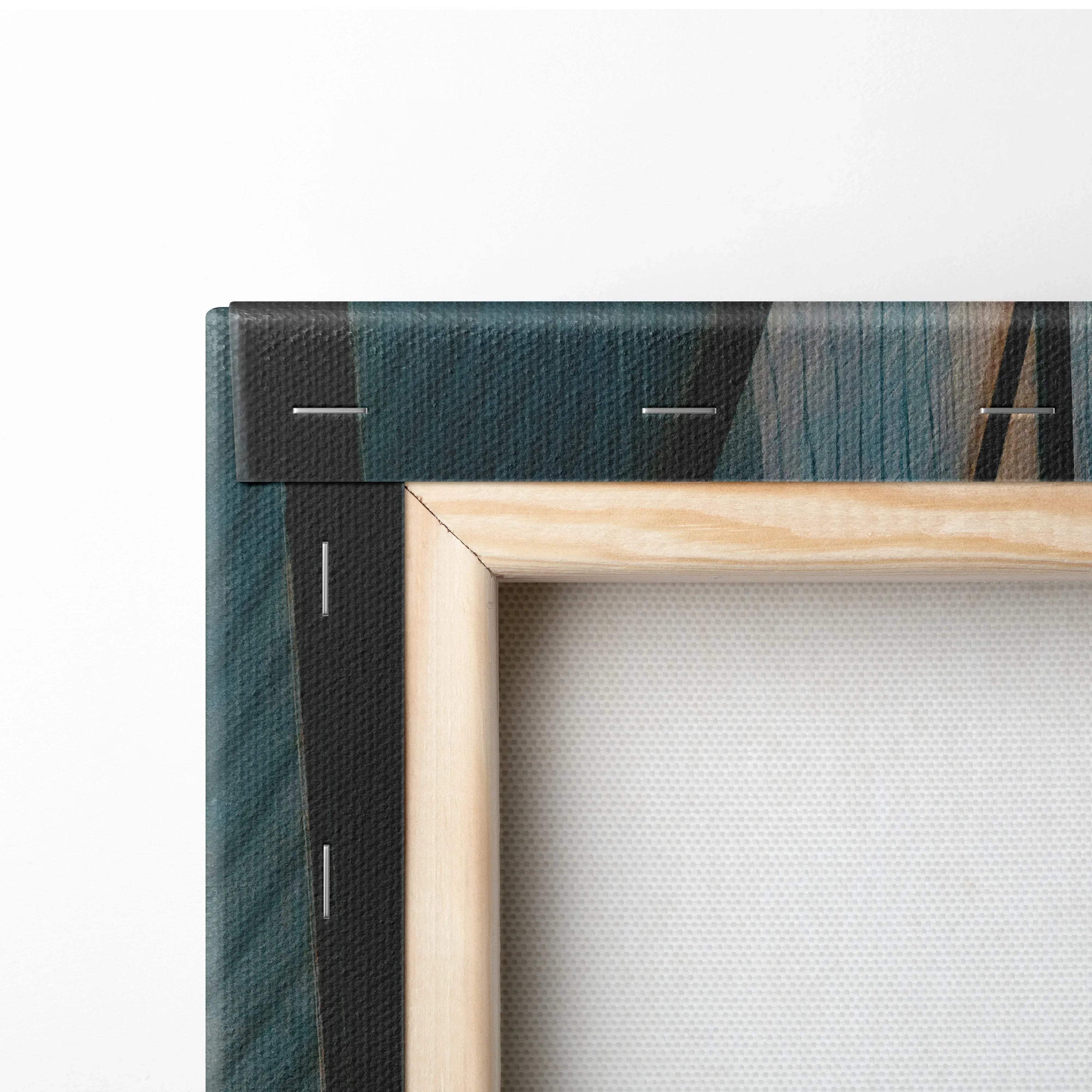 Close-up of stretched canvas wall art with wooden frame and urban building print edges.