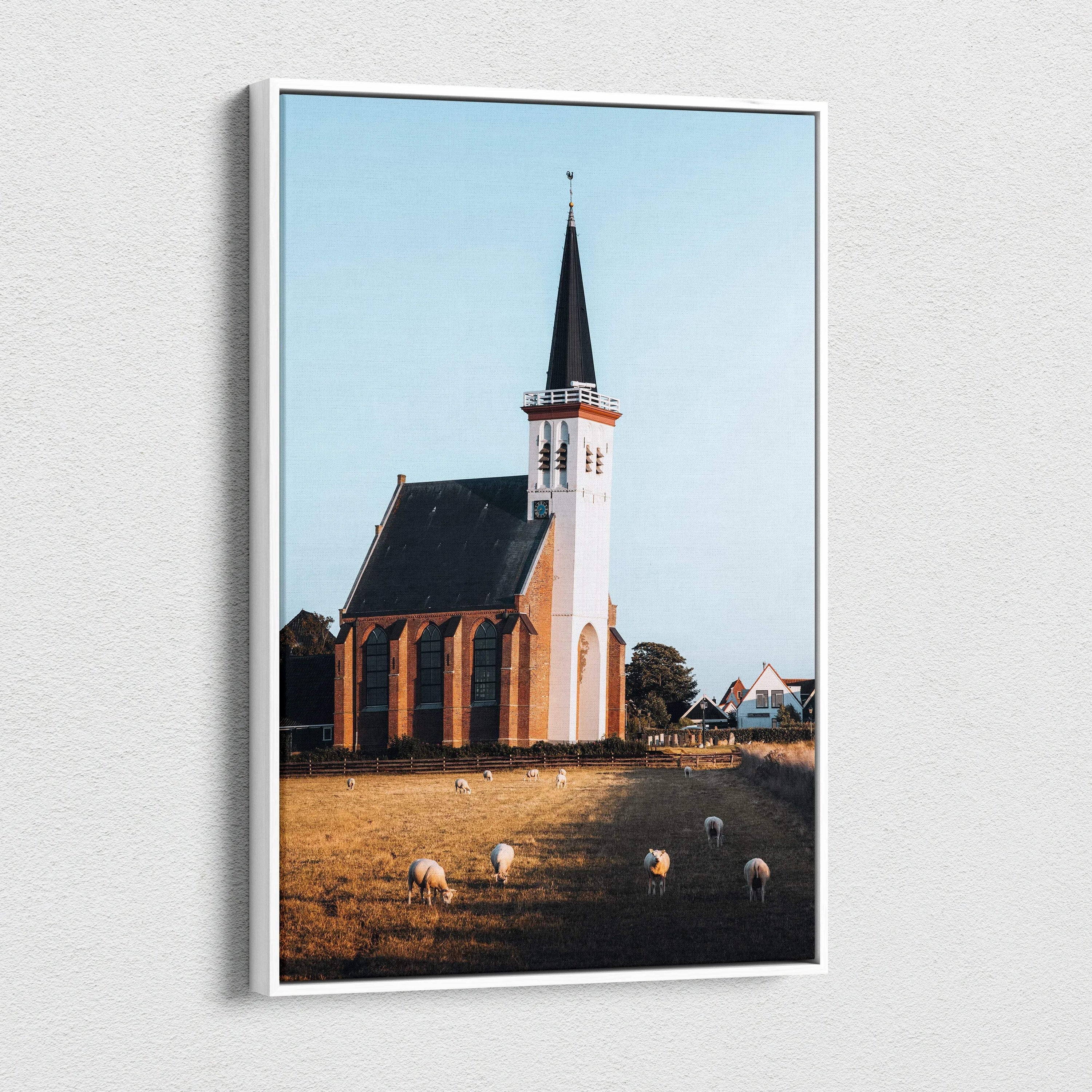 Canvas wall art featuring elegant urban church architecture with a tall spire against a clear blue sky.