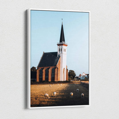 Canvas wall art featuring elegant urban church architecture with a tall spire against a clear blue sky.
