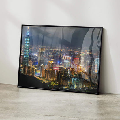 City night skyline poster with illuminated buildings in a black frame, modern wall art.