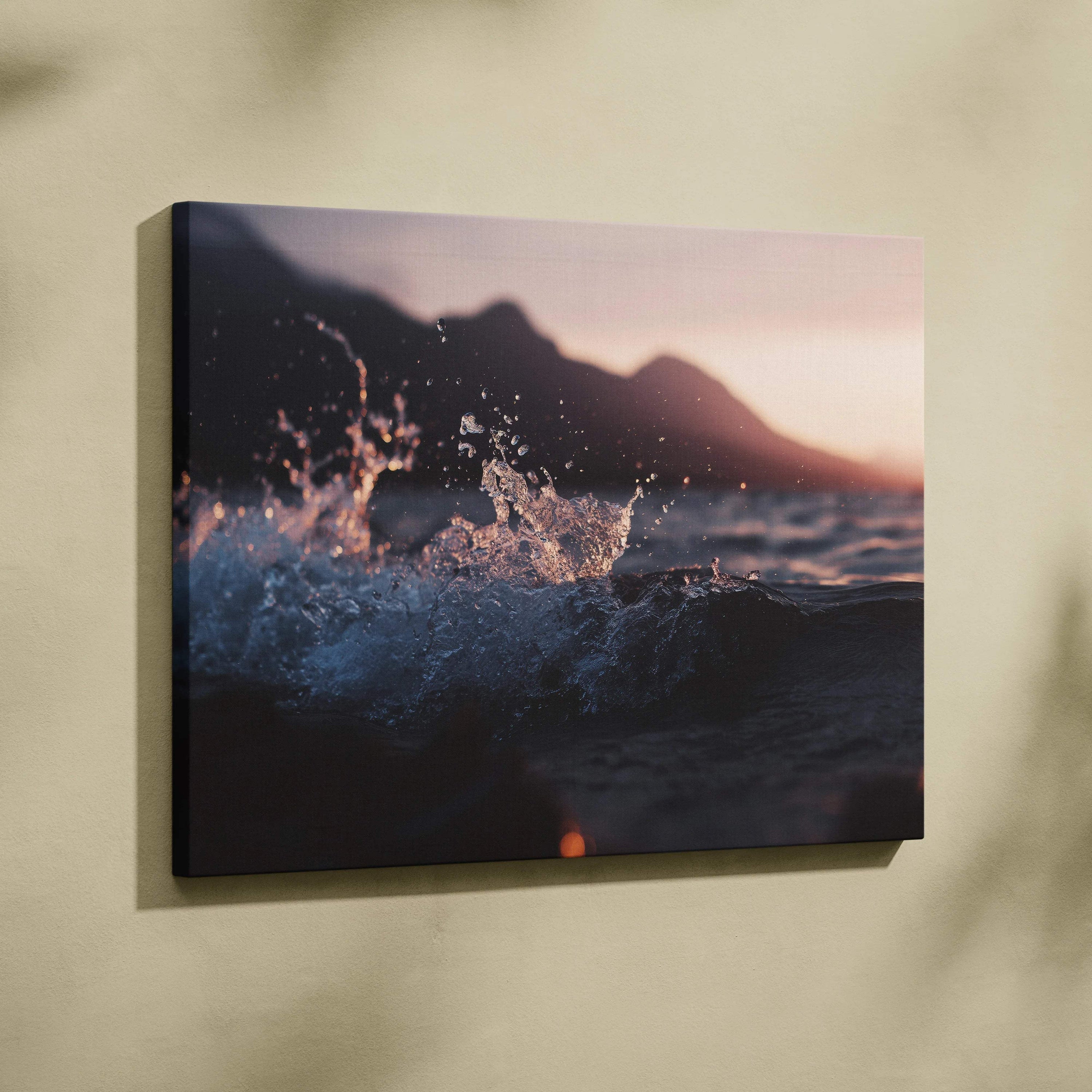 Moody cinematic ocean wave splash at sunset with mountains canvas art