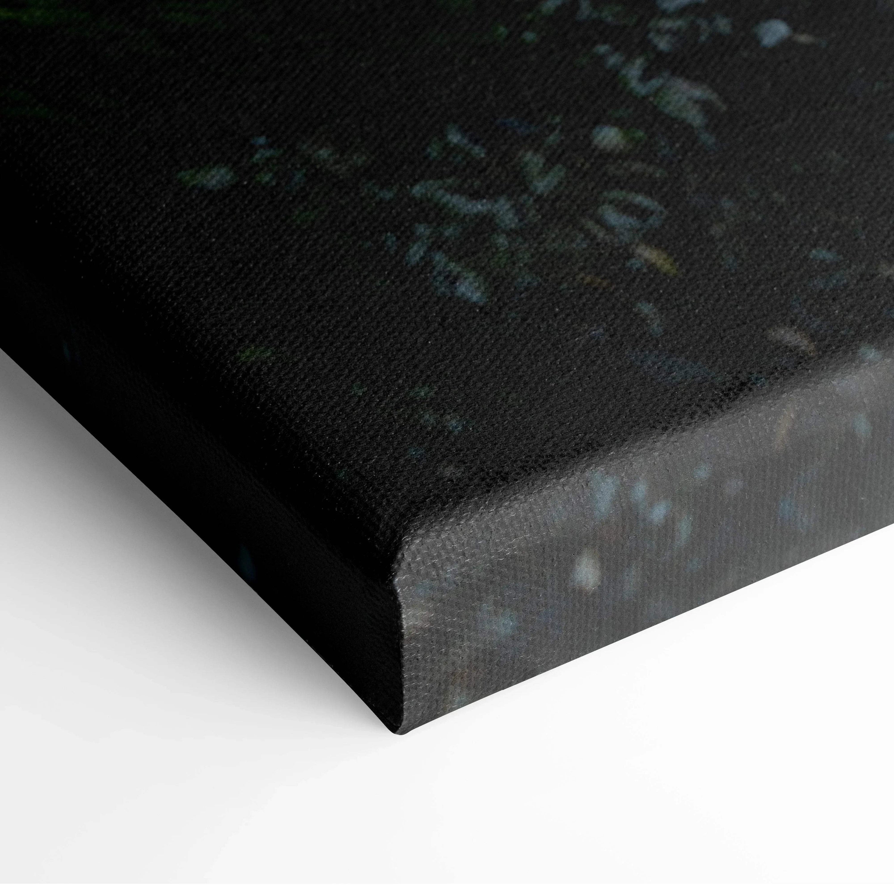 Close-up of serene beach sunset canvas wall art wrapped on black edge, showcasing textured canvas and dark color details.