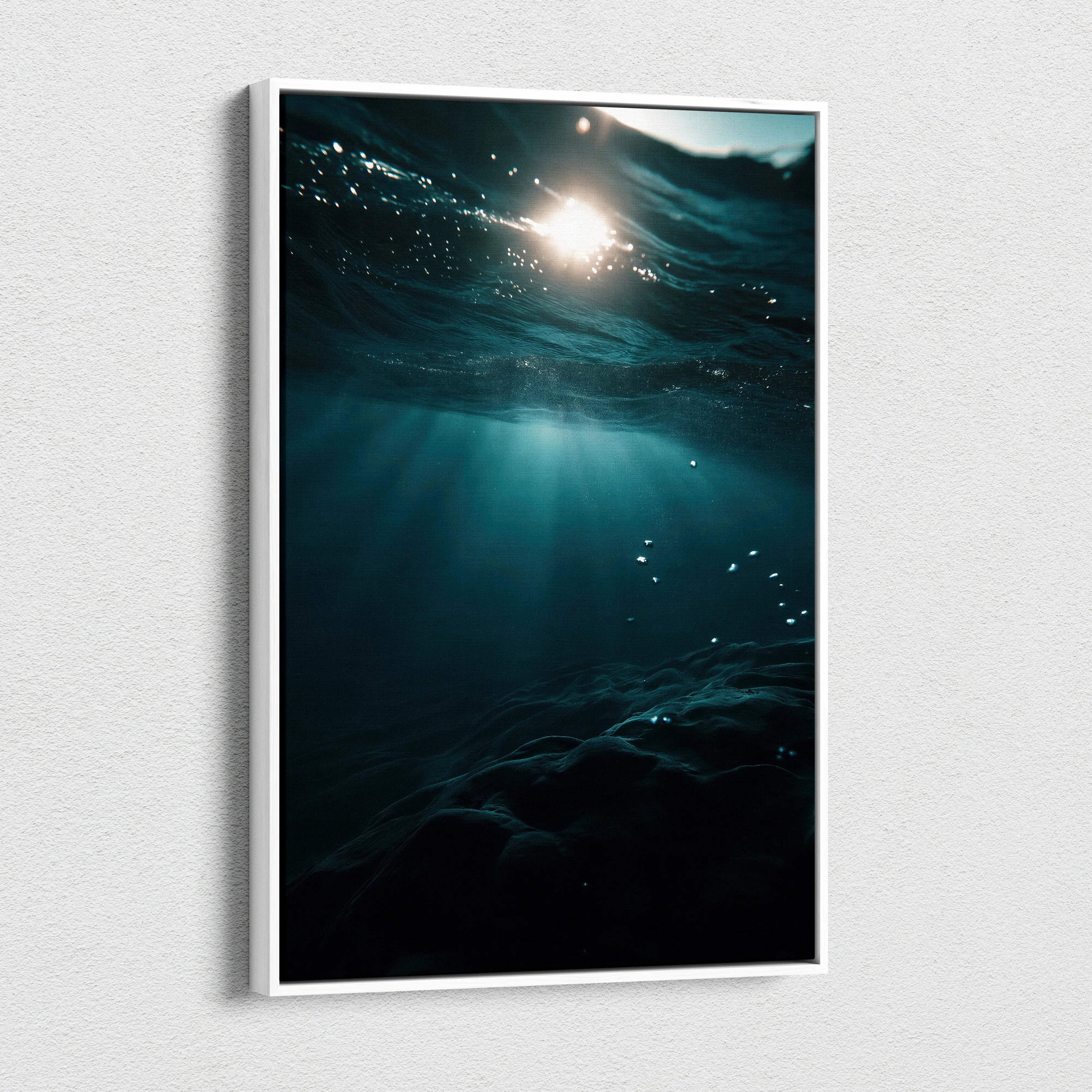 Vertical canvas wall art featuring sunlit ocean waves with deep blue tones and light reflections.