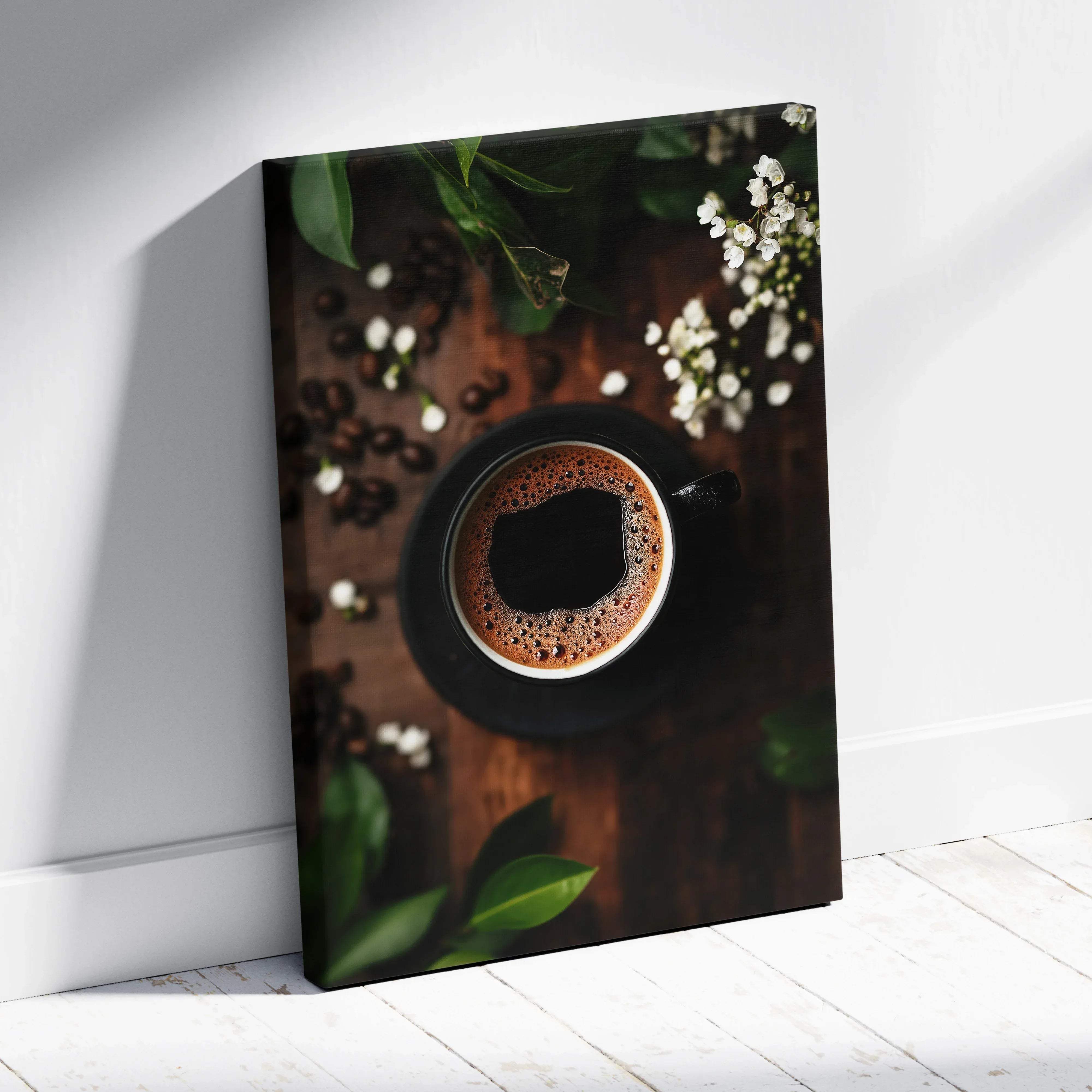 Black coffee cup with frothy surface on matching saucer surrounded by coffee beans and white flowers in warm brown tones canvas wall art