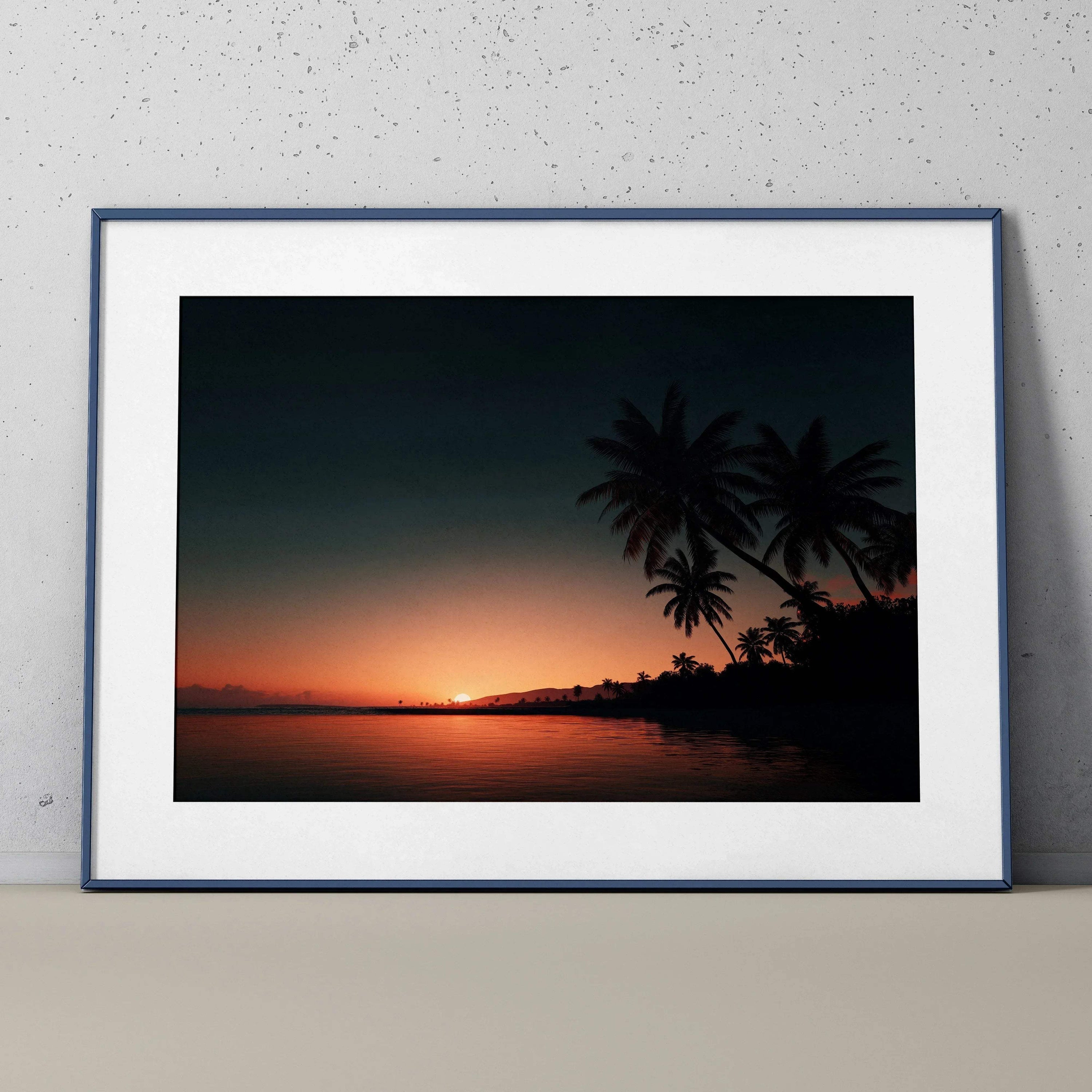 Captivating sunset over ocean with silhouetted palm trees digital art poster in black frame wall art.