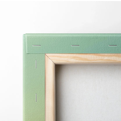 Green canvas frame with neatly stapled wooden stretcher bars for wall art.