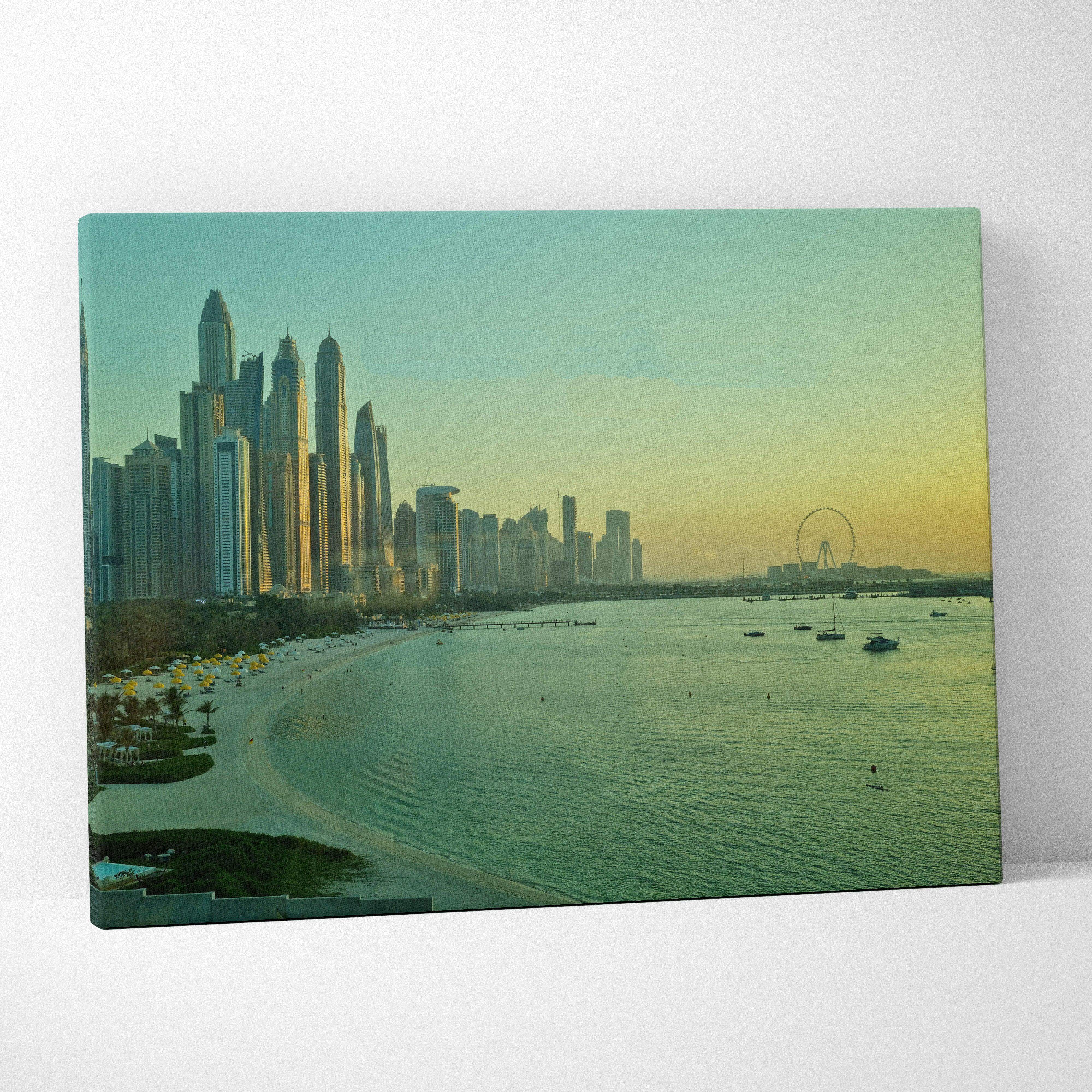 Canvas print of dubai skyline cityscape with glass skyscrapers and waterfront beach in sunset glow tones for modern décor