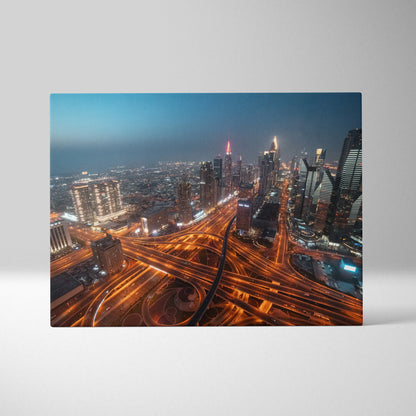 Vibrant urban cityscape canvas wall art featuring illuminated highways and skyscrapers at night.