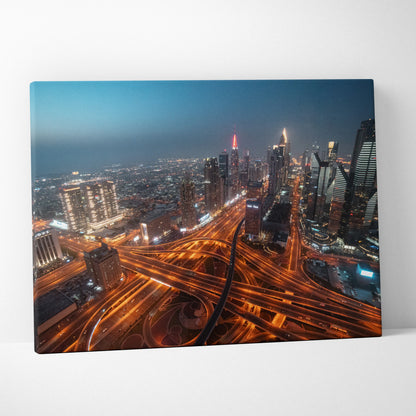 Vibrant urban cityscape at night with illuminated highway intersections on canvas wall art.