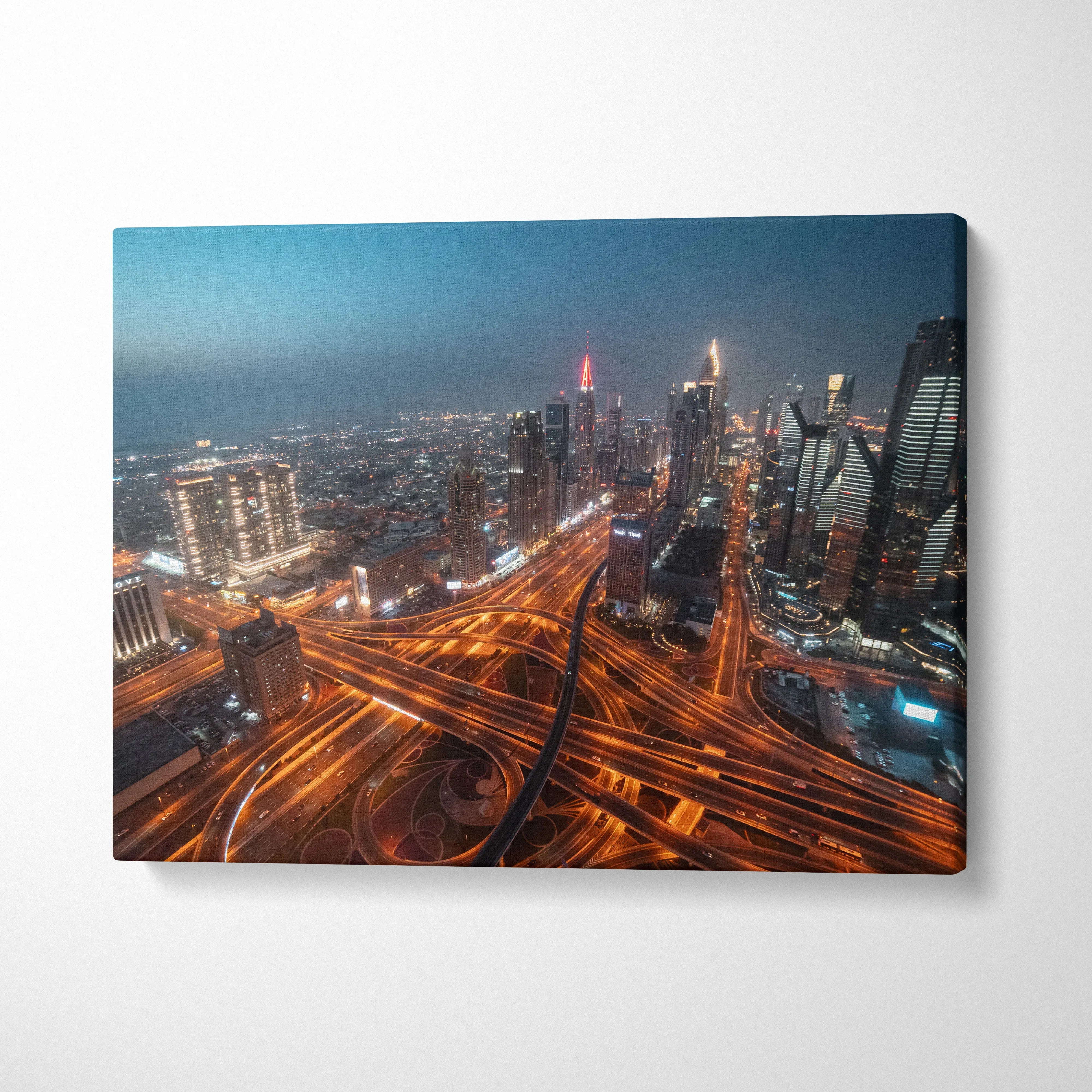 Vibrant urban cityscape canvas wall art showcasing illuminated highway interchanges at night.