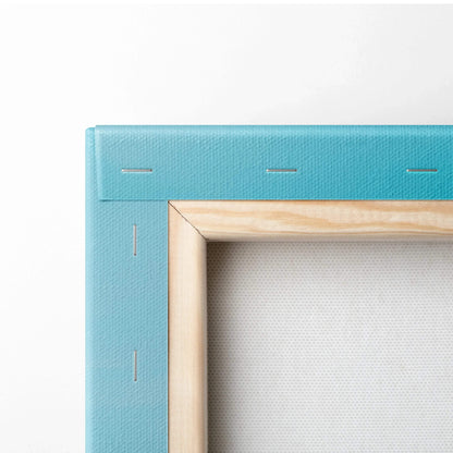 Blue canvas with natural wood stretcher bars and visible staples for wall art print.