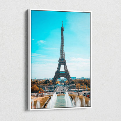 Vertical canvas wall art featuring the Eiffel Tower with bright blue sky background.