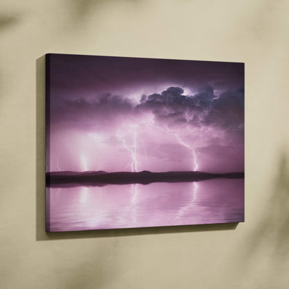 Pink lightning storm canvas art featuring a dramatic purple sky and reflective water in a dreamy landscape print