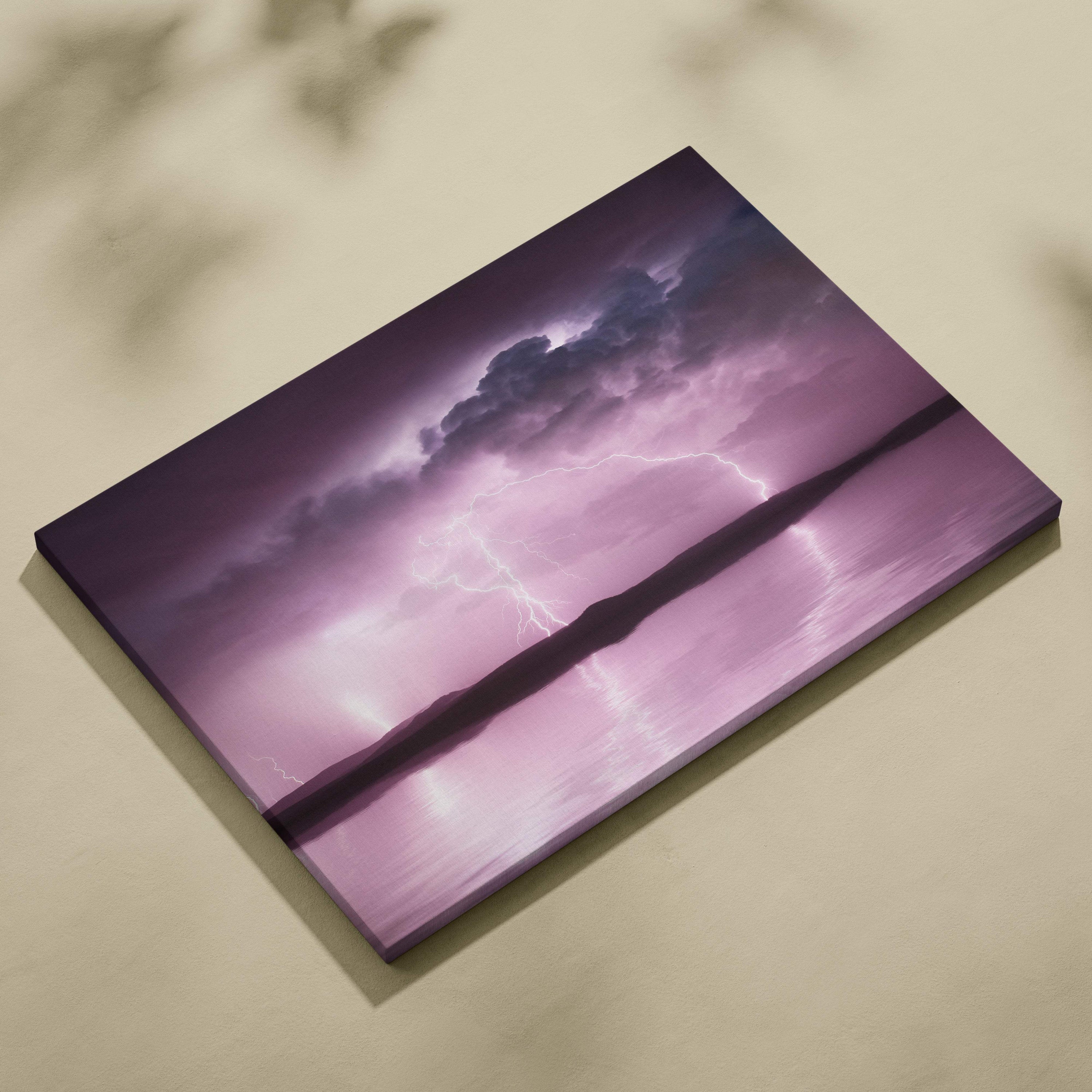 Pink lightning storm canvas art featuring a purple stormy sky with lightning reflecting on water for wall decor