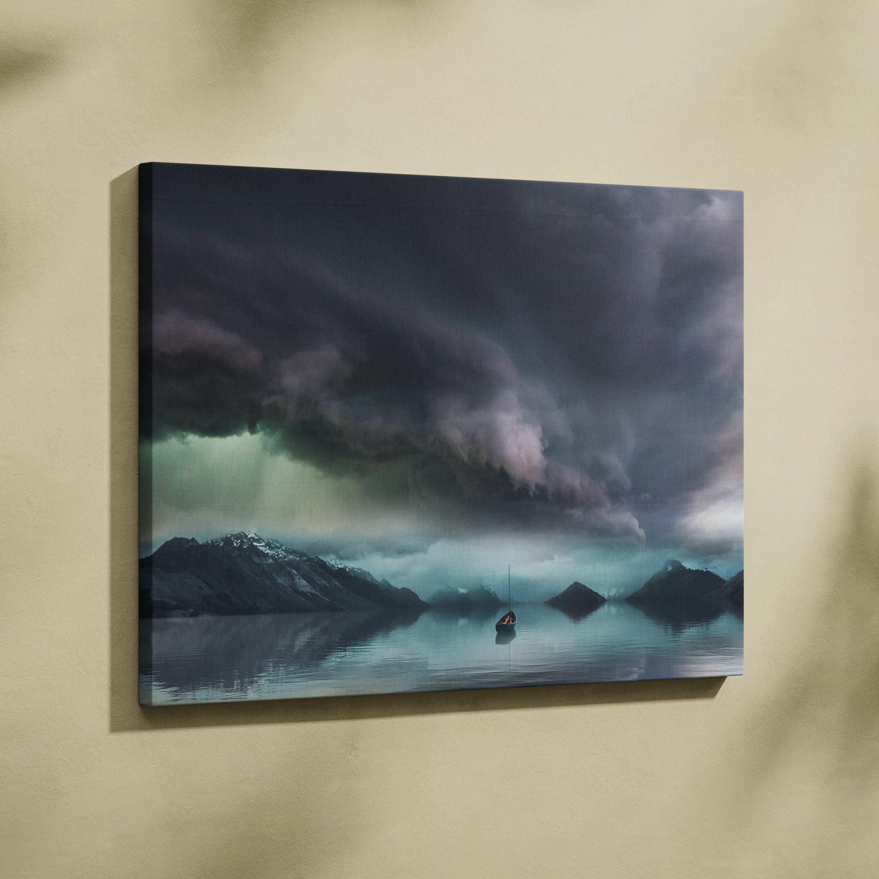 Rectangular canvas print of storm over silent lake with dark moody sky snow-capped mountains and calm water reflection
