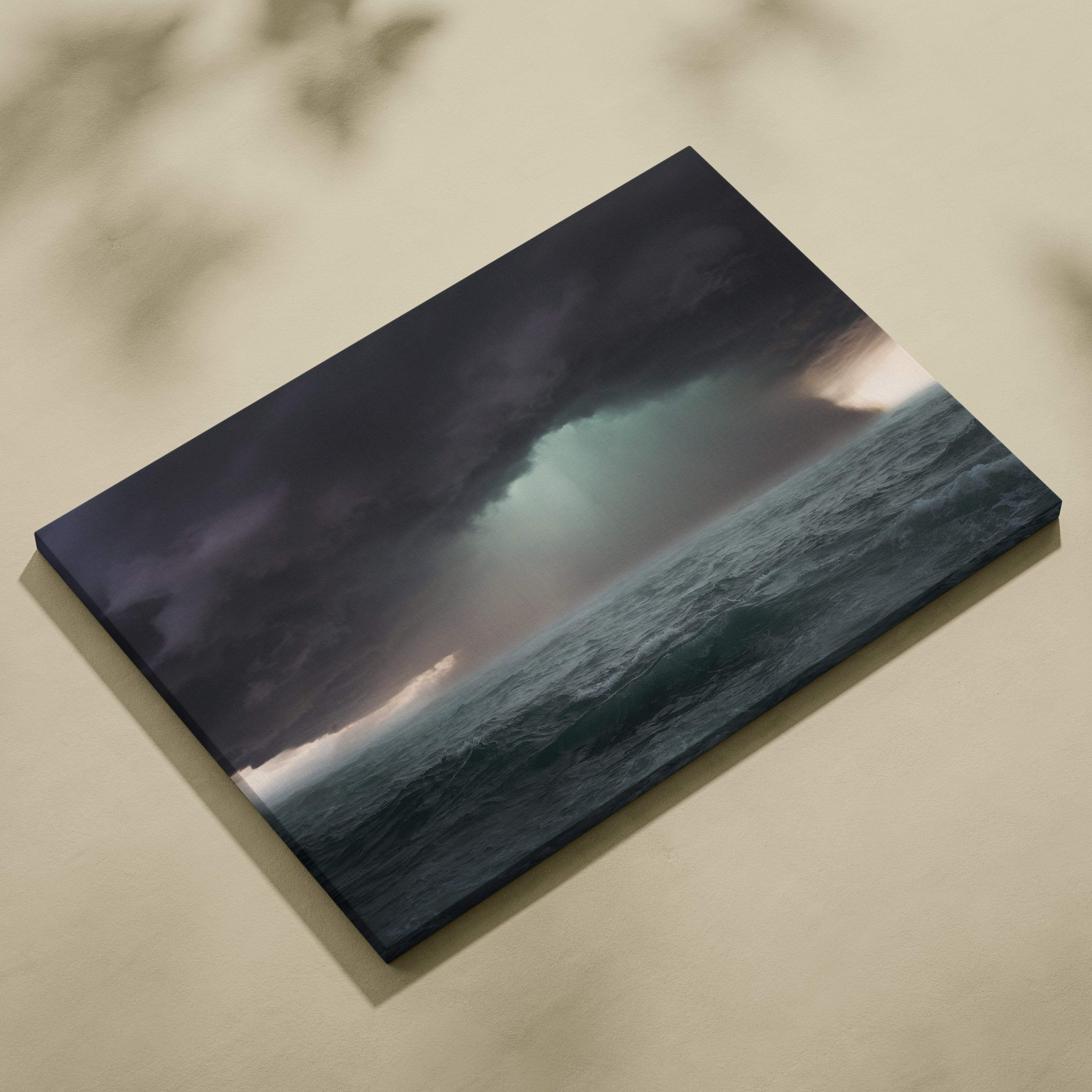 Dark blue canvas print of a dramatic stormy ocean wave with moody sky for rain wall seascape decor