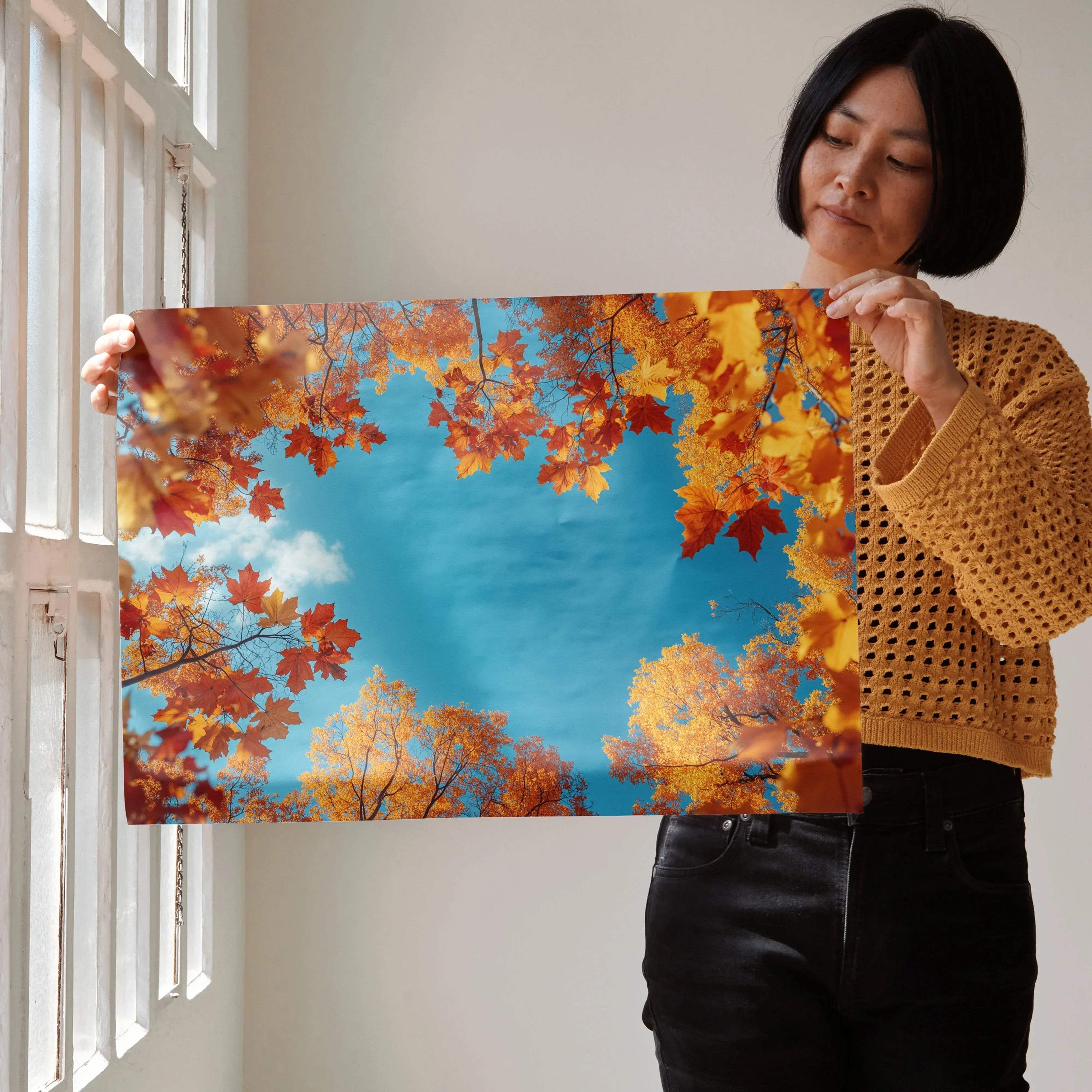 Autumn landscape poster with vibrant orange and red leaves against a bright blue sky wall art.