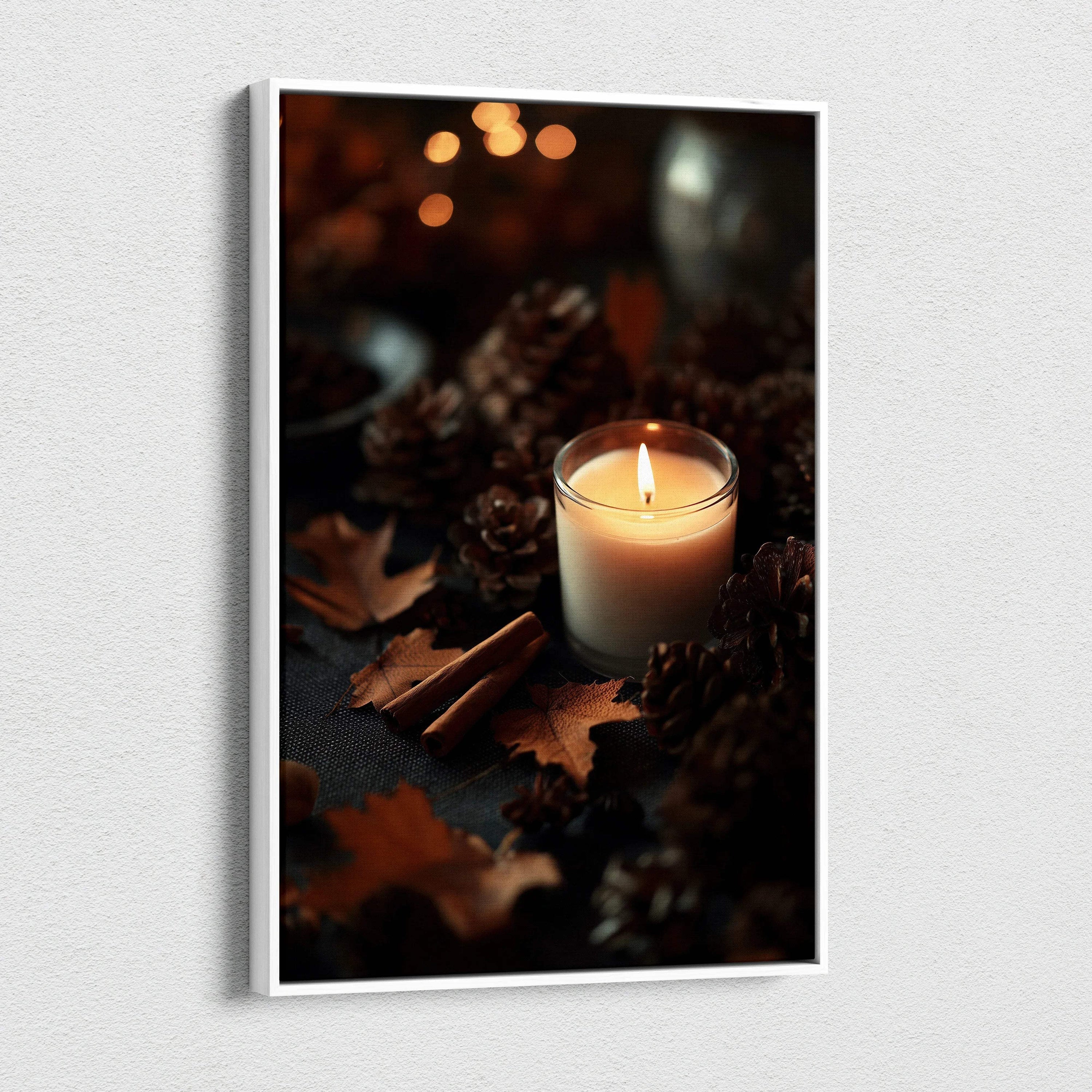 Canvas wall art featuring a glowing candle surrounded by pinecones and autumn leaves.