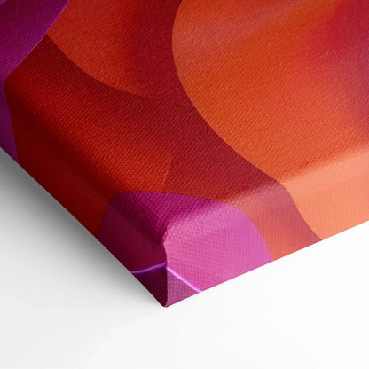 Close-up of vibrant abstract canvas art with bold red, orange, and purple fluid shapes on textured fabric surface.