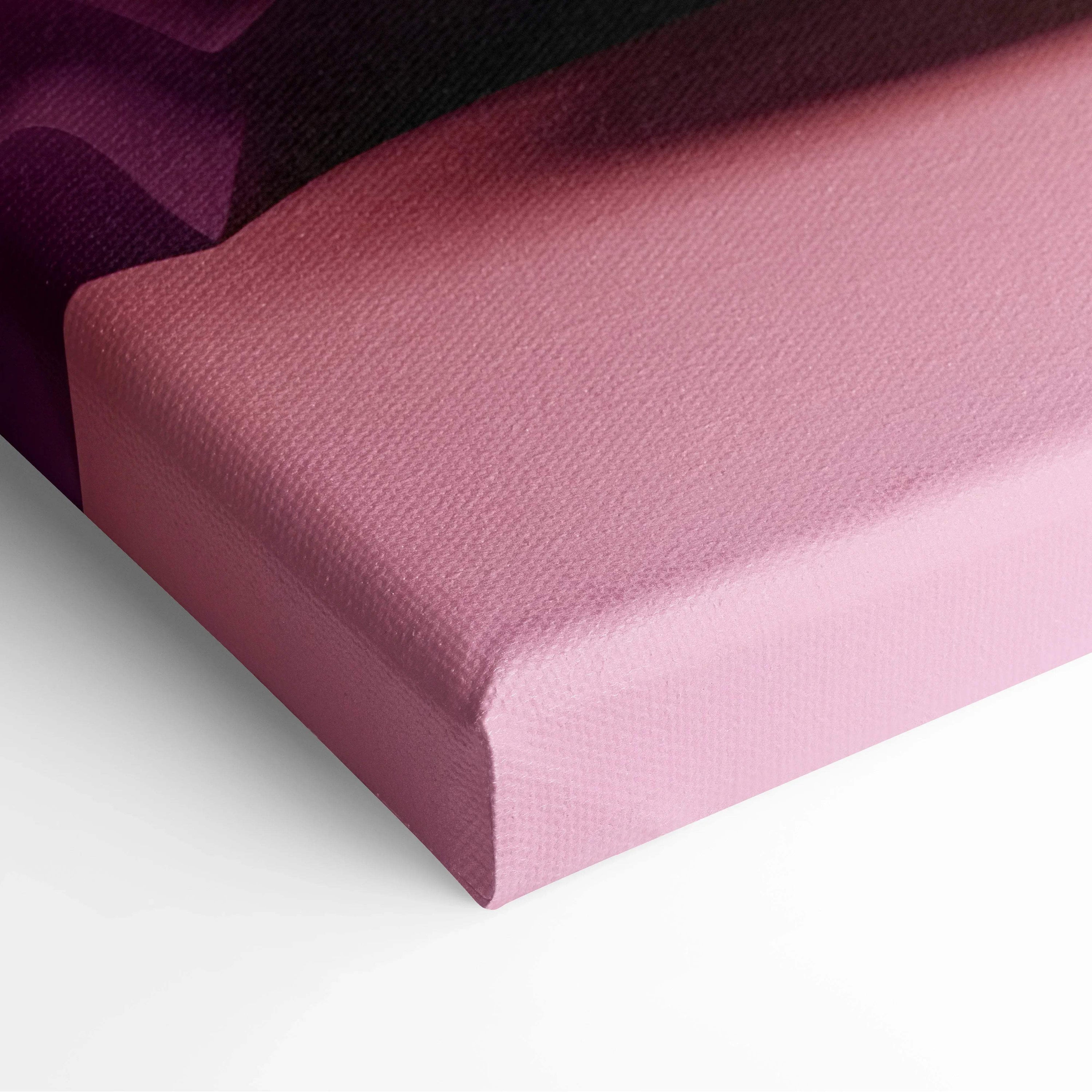 Pink canvas stretched tightly over wooden frame with textured fabric surface.