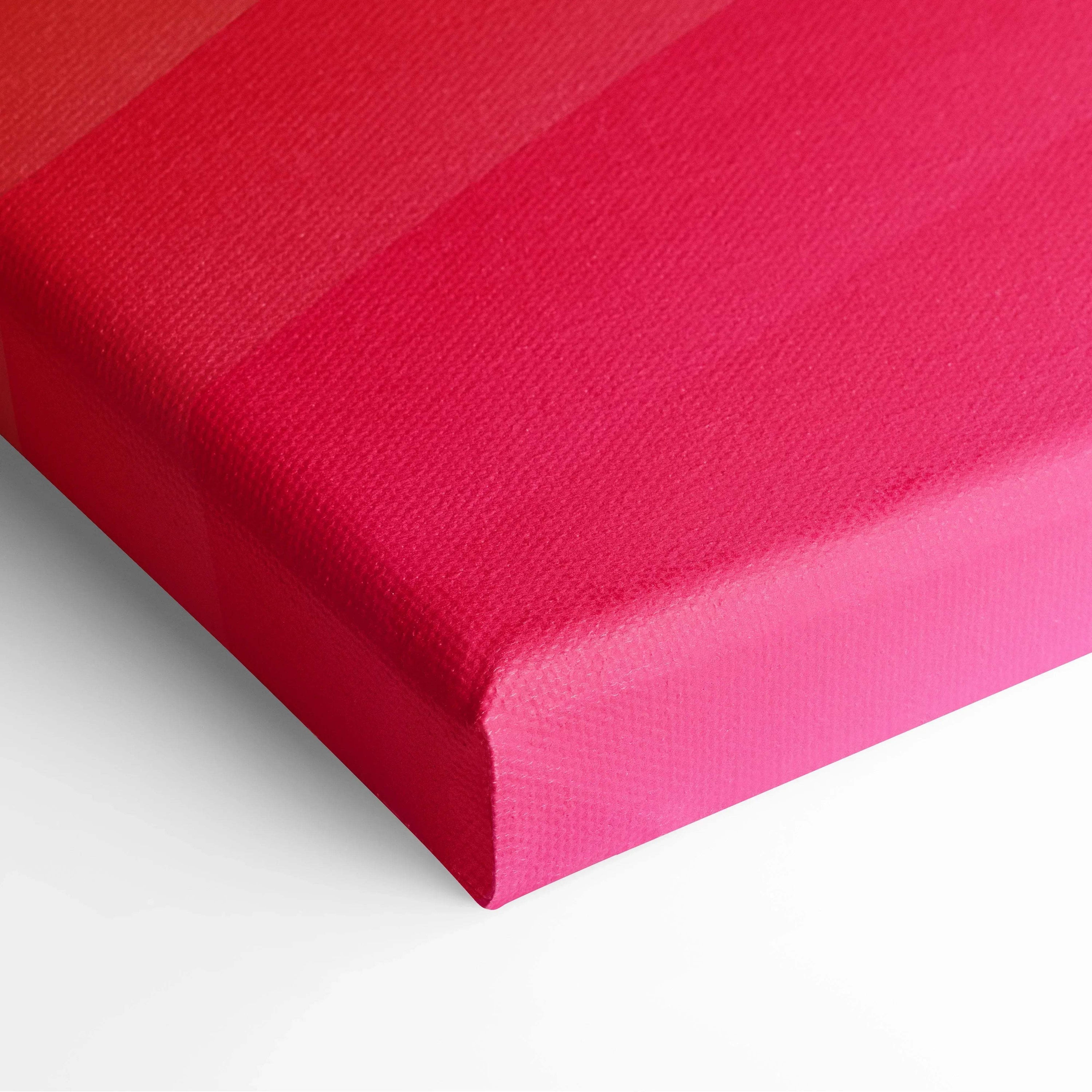 Close-up of vibrant pink abstract digital canvas art with smooth, textured surface and sharp corner edges.