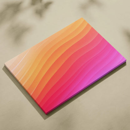 Abstract canvas wall art featuring smooth gradient waves in warm orange, red, and pink tones.