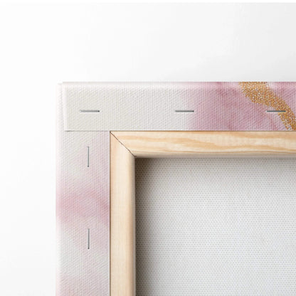 Corner detail of stretched canvas art with wooden frame and stapled edges for wall art display.