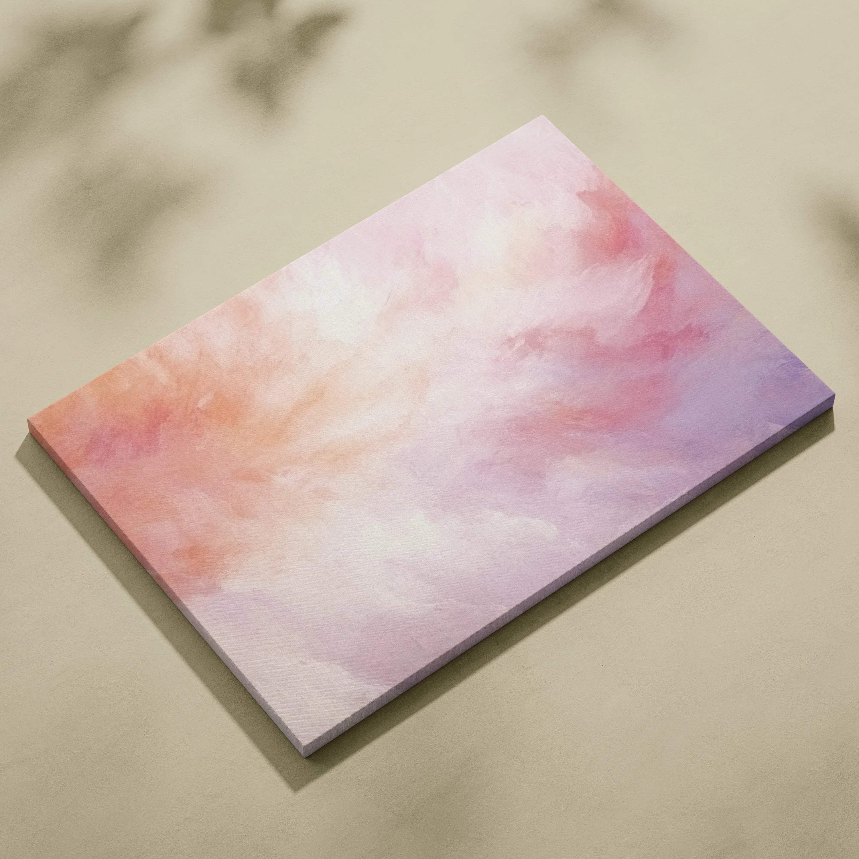 Canvas wall art with soft gradient abstract design in warm peach, pink, and lavender tones.