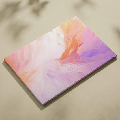 Abstract modern canvas wall art with soft swirls of pink, orange, and lavender hues in a smooth, blended design.