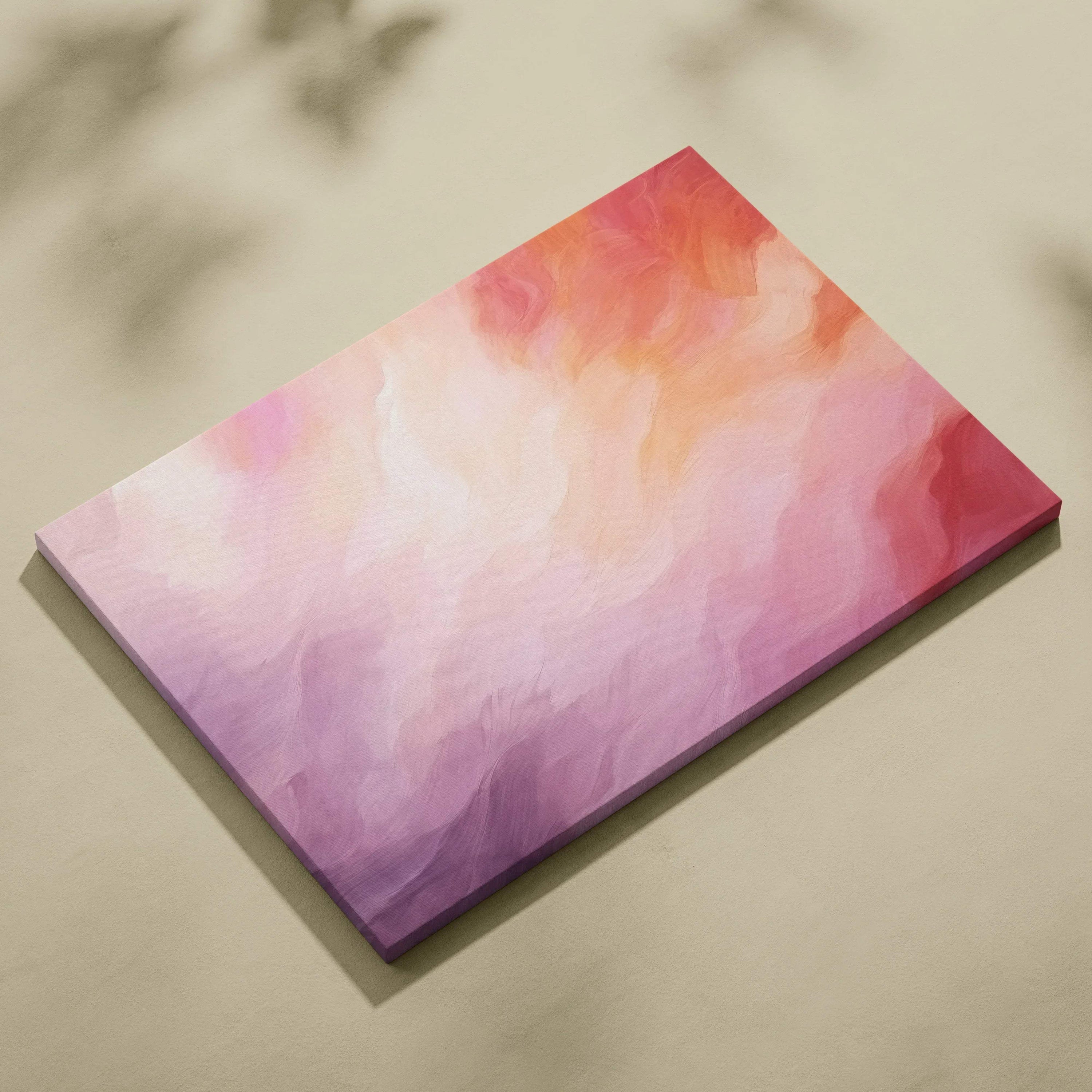 Abstract canvas art with vibrant gradient shades of pink, red, and orange blending smoothly.