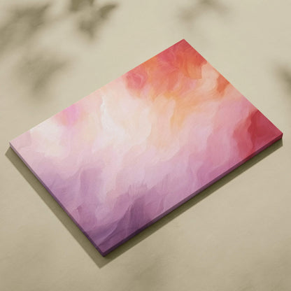 Abstract canvas art with vibrant gradient shades of pink, red, and orange blending smoothly.