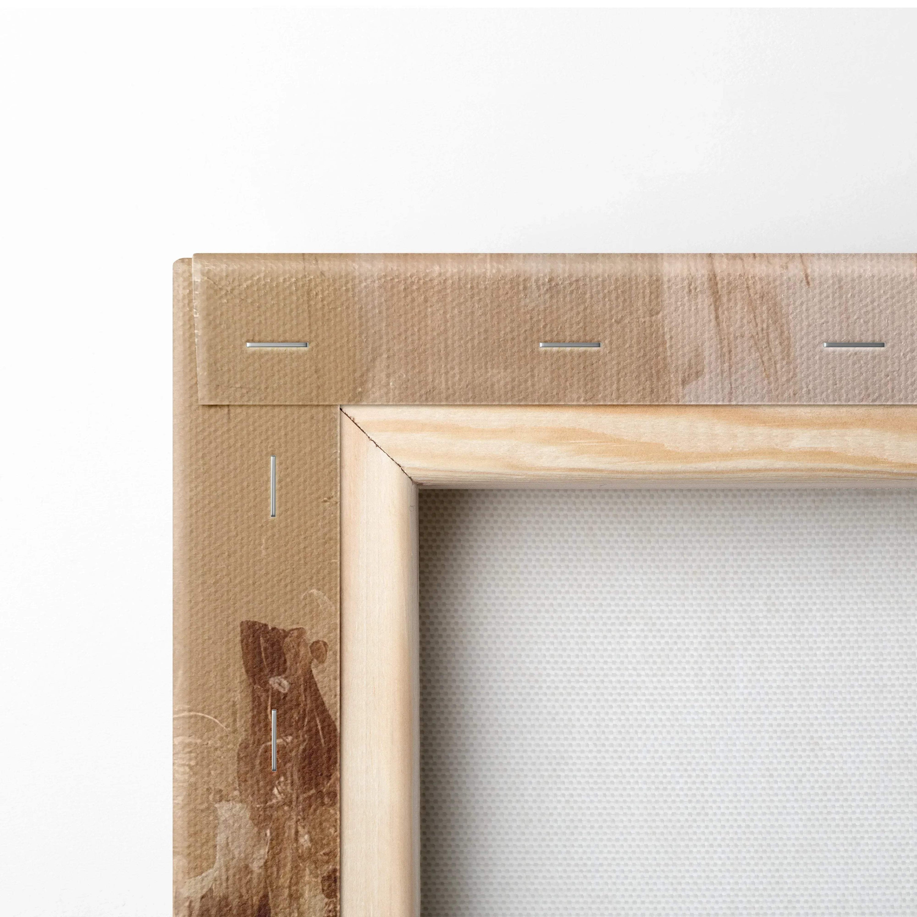 Close-up of wooden stretched canvas corner with staple fastening and blank white fabric canvas.