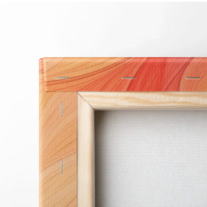 Close-up of wooden frame corner and vibrant orange-red canvas texture on abstract digital wall art canvas print.