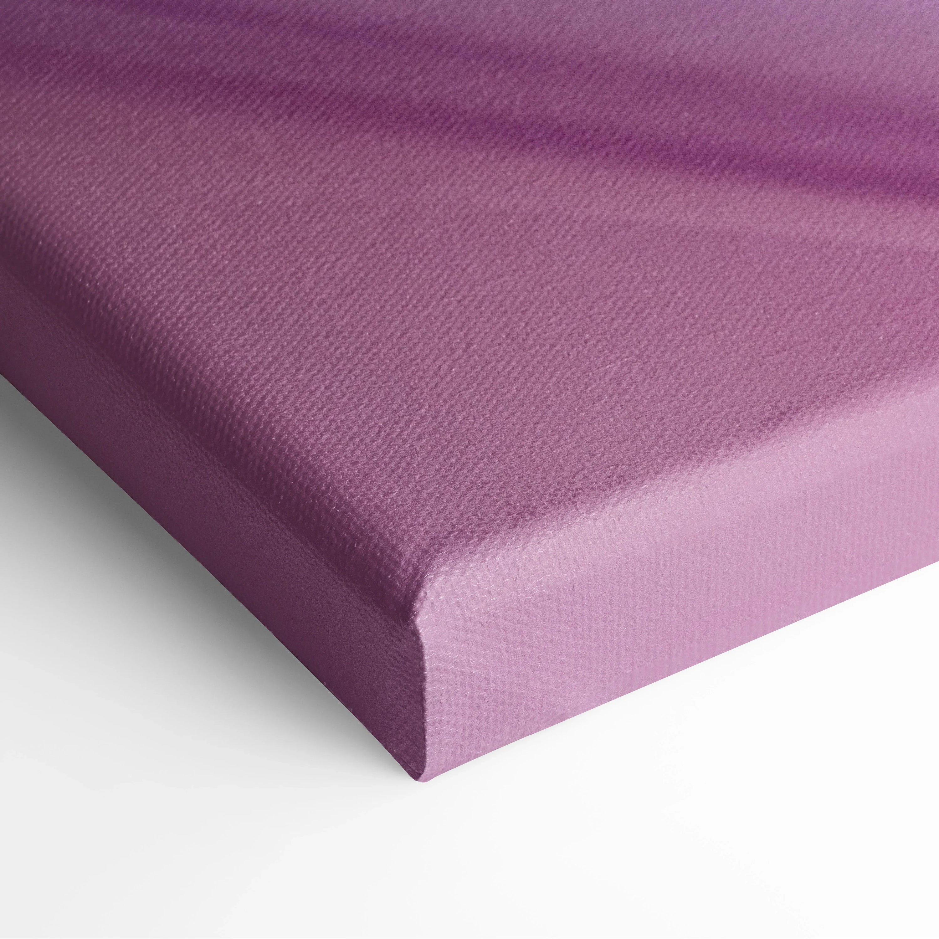Close-up of purple abstract digital art on textured canvas wall art with a clean stretched edge.