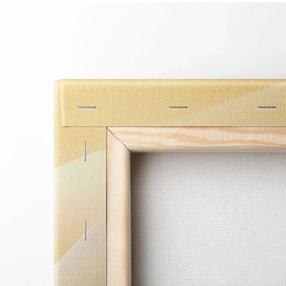 Close-up of wooden frame and beige canvas stretched with staples for abstract wall art canvas print.
