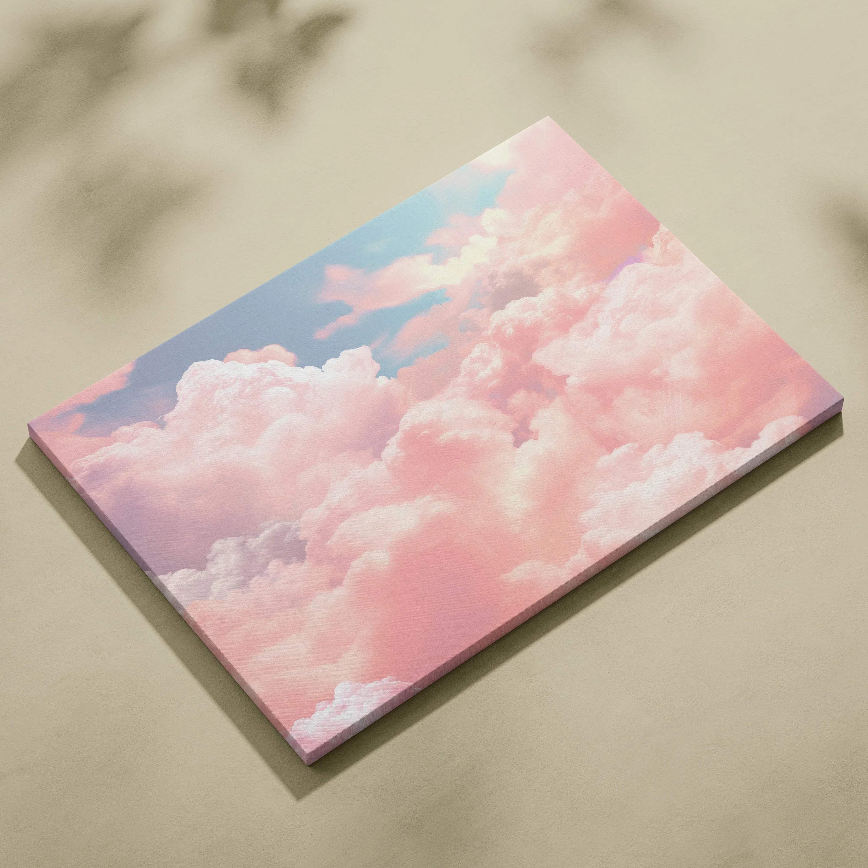 Canvas wall art featuring soft pink clouds against a blue sky in an abstract digital style.